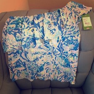 Lilly Pulitzer one shoulder shirt.